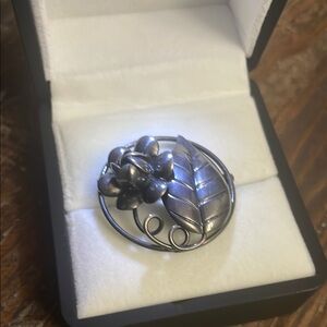 Elegant Silver Floral Brooch